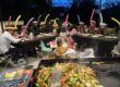 Family enjoying a backyard hibachi party in Barrie for a summer birthday celebration