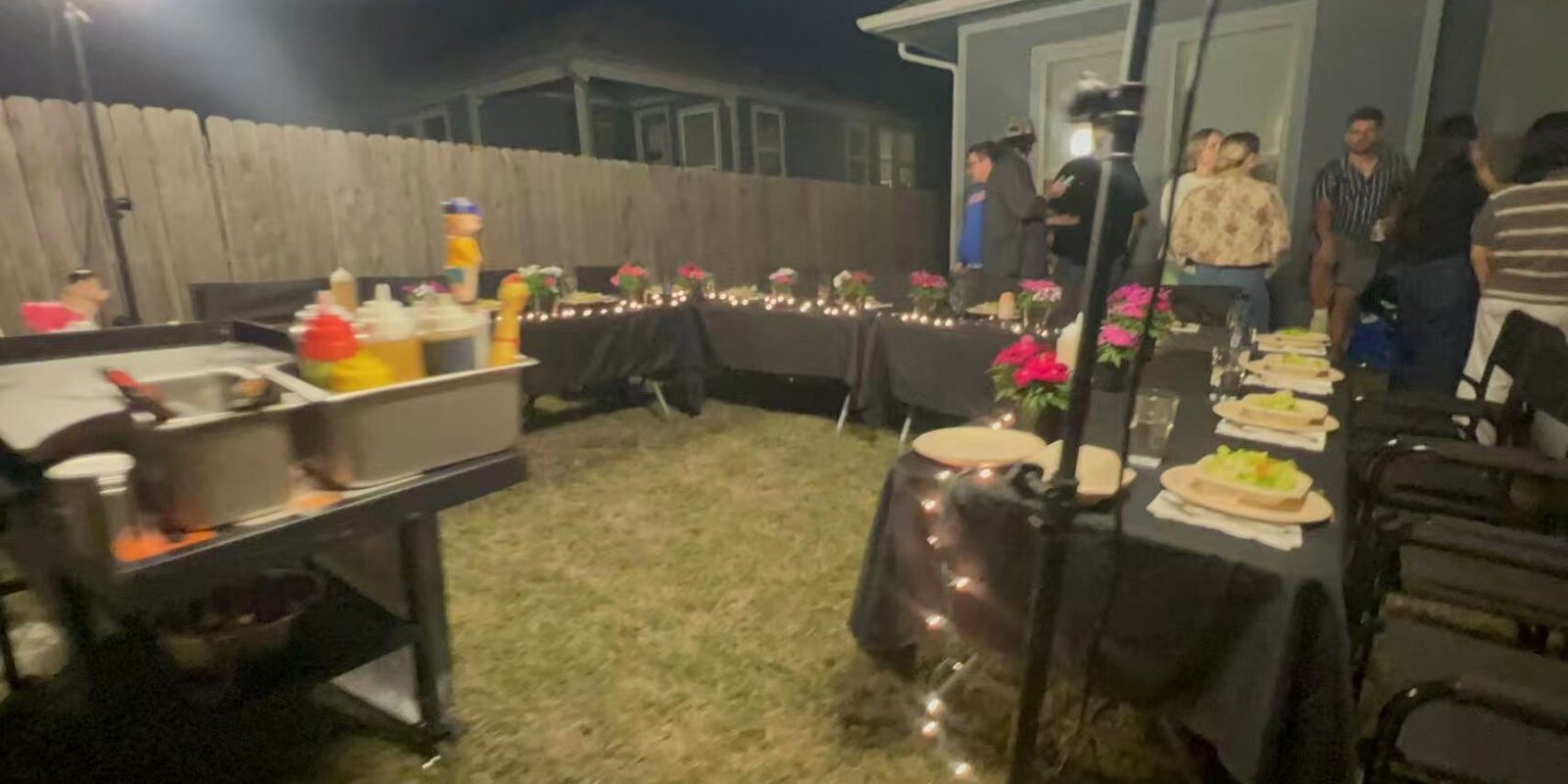 Festive backyard hibachi party setup in Toronto with a private chef cooking at the grill