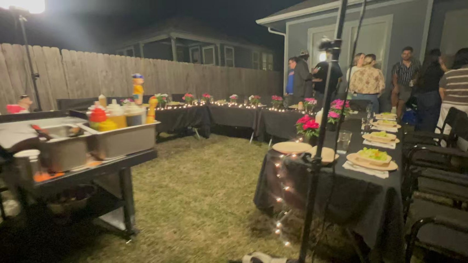 Festive backyard hibachi party setup in Toronto with a private chef cooking at the grill for a birthday gathering.