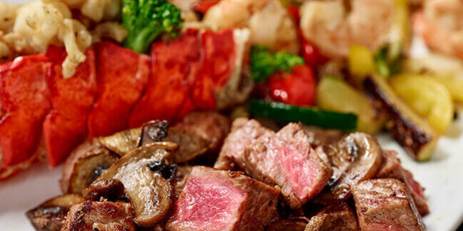 Private hibachi chef cooking on a backyard grill for an Oakville engagement party celebration